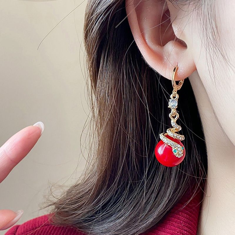 🐍Specjalna oferta noworoczna🎀 Kolczyki z pozłacanej perły w kształcie węża